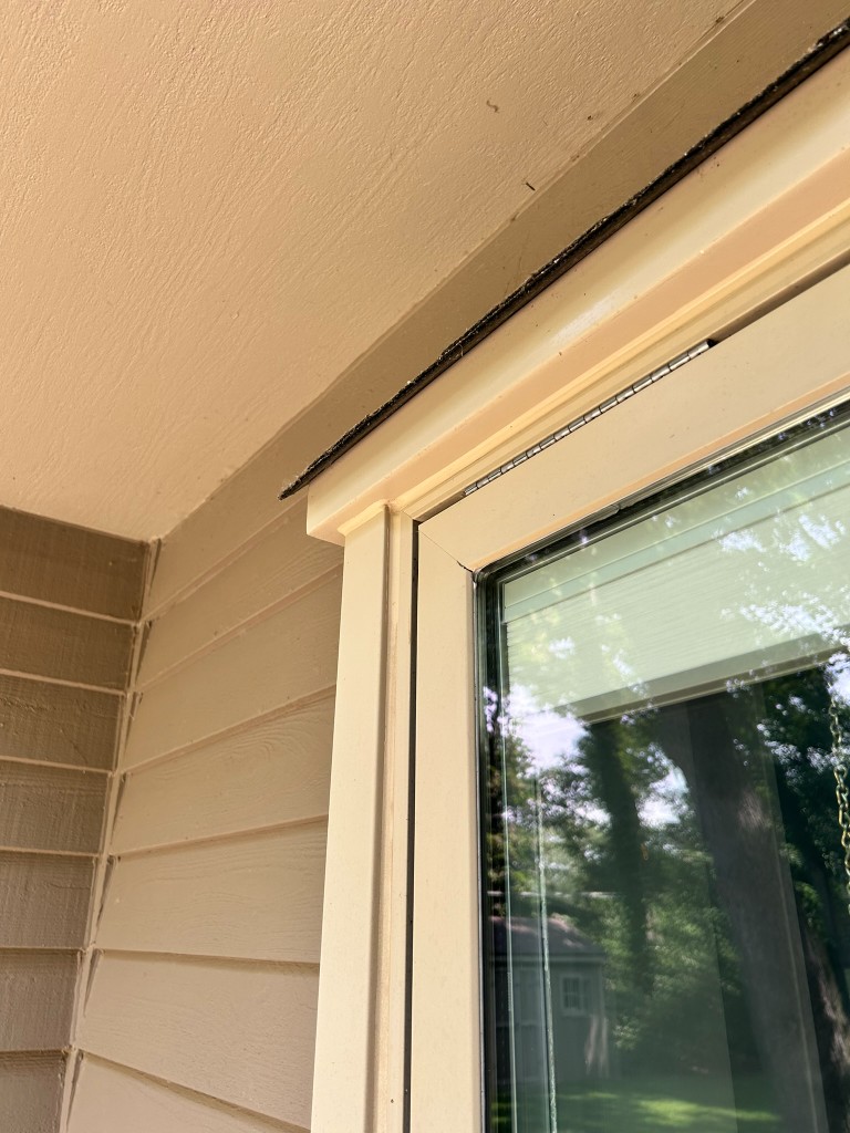 Clean window trim and siding after installation and finish work